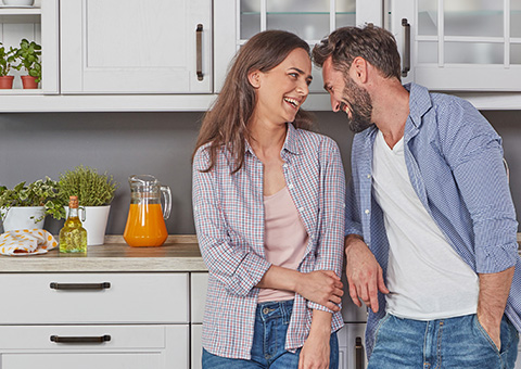 Couple in their kitchen